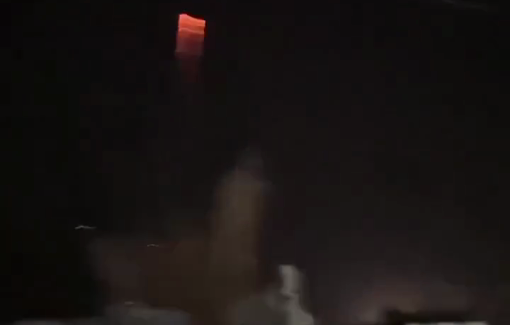 Thumbnail preview image for the video titled: Israeli warplanes struck a building beside displacement tents in the Al-Ansar area, igniting fires and damaging the surroundings