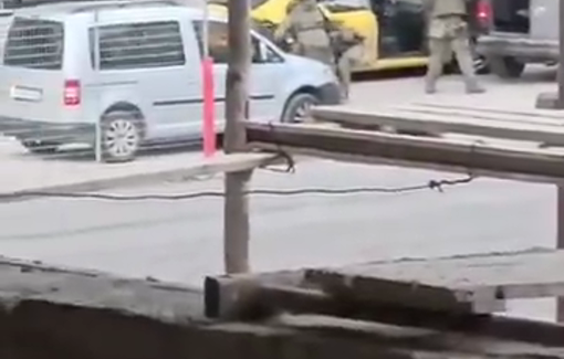 Thumbnail preview image for the video titled: Israeli special forces abused and dragged a Palestinian youth to the ground after shooting and injuring him in the Al-Bustan neighborhood in Nablus