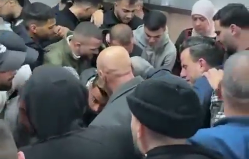 Thumbnail preview image for the video titled: Mourners carried the body of 23-year-old Ali Majed Hamadneh during his funeral at Palestine Medical Complex