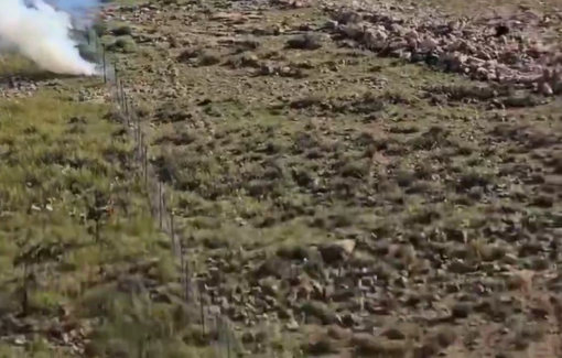 Thumbnail preview image for the video titled: The Israeli army, together with settlers, is throwing stones and tear gas canisters at Palestinian students on their way to school in Umm al-Khair