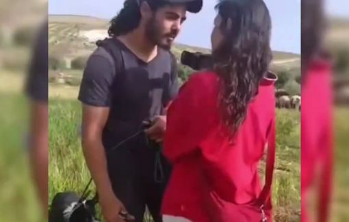 Thumbnail preview image for the video titled: An Israeli settler sexually harasses a solidarity activist in Huwara village while Israeli troops abuse & others steal Palestinian wheat