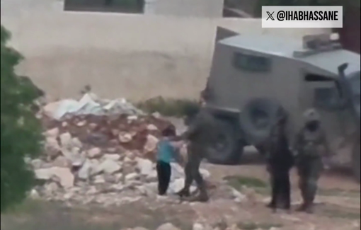 Thumbnail preview image for the video titled: An Israeli soldier assaulting Palestinian children in the village of Al-Mughayyir