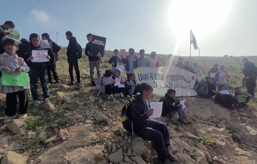 Thumbnail preview image for the video titled: Palestinian children from the village of Umm al-Khair protesting after Israeli settlers blocked the road to their school