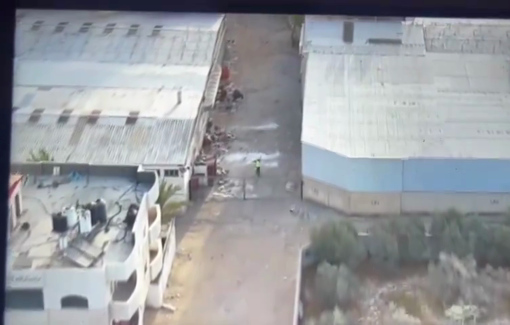 Thumbnail preview image for the video titled: Aid worlers wave white flag at Israeli forces who struck an aid warehouse